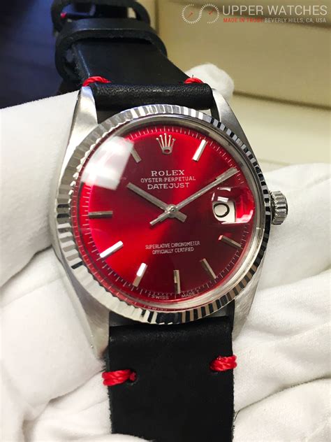 red rolex dial